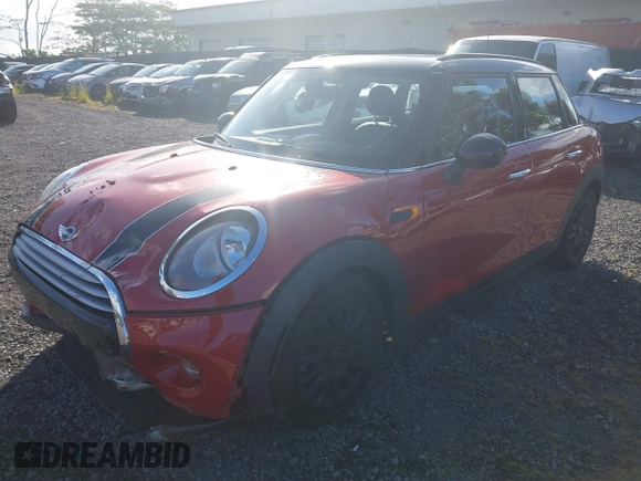 2015 MINI Hardtop 4 Door z VIN WMWXS5C57F2C63418, wystawiony jako IAAI lot #41938785 z przebiegiem 101 712 mil mil oraz . Historia ofert i sprzedaży dostępna na DreamBid. Obrazek 2.