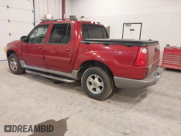 2003 Ford Explorer Sport Trac XLS z VIN 1FMZU67EX3UC27706, wystawiony jako IAAI lot #42214344 z przebiegiem 181 537 mil mil oraz . Historia ofert i sprzedaży dostępna na DreamBid. Obrazek 3.