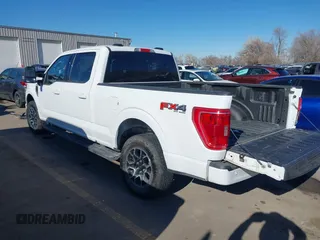 2023 Ford F-150 XL with VIN 1FTFW1E87PFB31057, listed as a IAAI auction lot 41388451 with 28,233 mi miles. Bid and sale history available at carsss.com. Image 3.
