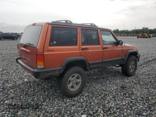 1999 Jeep Cherokee Sport with VIN 1J4FF68S7XL560943, listed as a Copart auction lot 58425505 with 68,654 mi miles and Salvage title. Bid and sale history available at DreamBid. Image 3.