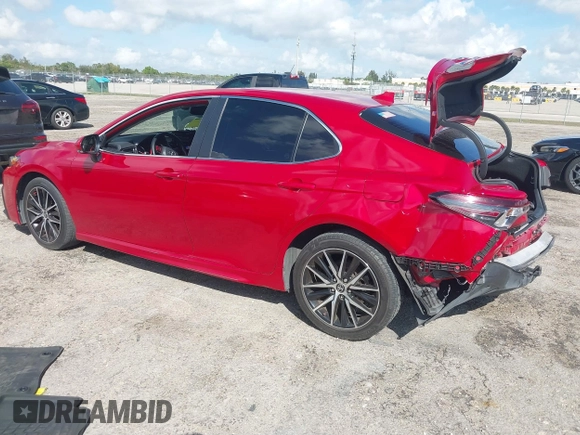 2022 Toyota Camry SE with VIN 4T1S11AK1NU052325, listed as a IAAI auction lot 41618906 with 64,632 mi miles and . Bid and sale history available at DreamBid. Image 3.