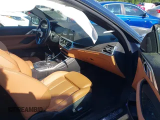 2022 BMW 4 Series 430i xDrive z VIN WBA73AP00NCH75602, wystawiony jako IAAI lot #42200149 z przebiegiem 68 540 mil mil oraz . Historia ofert i sprzedaży dostępna na DreamBid. Obrazek 5.