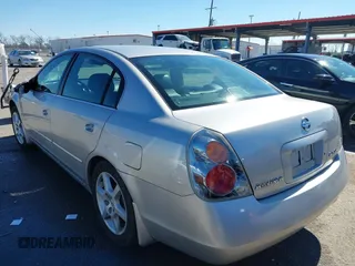 2003 Nissan Altima S with VIN 1N4AL11D63C321486, listed as a IAAI auction lot 41581386 with 200,082 mi miles. Bid and sale history available at carsss.com. Image 3.