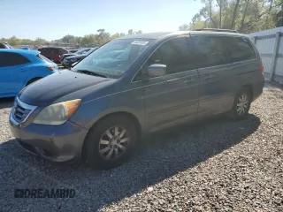 2010 Honda Odyssey EX with VIN 5FNRL3H41AB060928, listed as a Copart auction lot 46581665 with 203,063 mi miles and Salvage Title. Bid and sale history available at carsss.com. Image 1.
