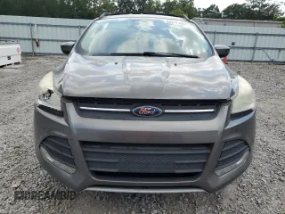 2013 Ford Escape SE z VIN 1FMCU9GX3DUB89486, wystawiony jako Copart lot #62277105 z przebiegiem 108 360 mil mil oraz Czysty tytuł • Clean title. Historia ofert i sprzedaży dostępna na DreamBid. Obrazek 5.