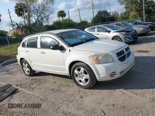 2009 Dodge Caliber SXT with VIN 1B3HB48A69D130857, listed as a IAAI auction lot 41526199 with 163,796 mi miles and . Bid and sale history available at DreamBid. Image 13.