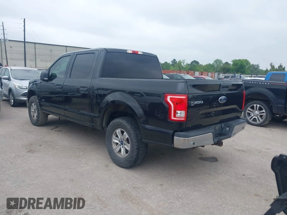 2015 Ford F-150 XLT with VIN 1FTEW1EG4FKD11928, listed as a IAAI auction lot 41912864 with 270,804 mi miles. Bid and sale history available at carsss.com. Image 3.