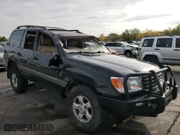 1999 Toyota Land Cruiser with VIN JT3HT05J4X0060695, listed as a Copart auction lot 75541434 with 282,651 mi miles and Salvage Title. Bid and sale history available at carsss.com. Image 4.