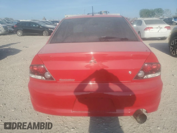 2005 Mitsubishi Lancer Evolution VIII z VIN JA3AH86DX5U016842, wystawiony jako Copart lot #51257475 z przebiegiem 72 698 mil mil oraz Szkoda całkowita • Salvage title. Historia ofert i sprzedaży dostępna na DreamBid. Obrazek 6.