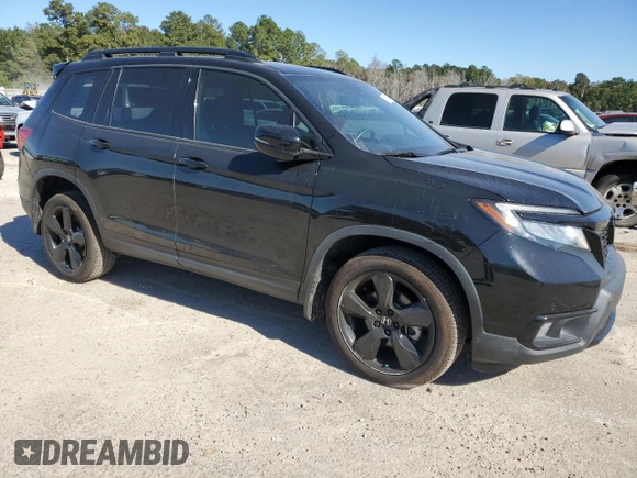 2021 Honda Passport Elite with VIN 5FNYF8H01MB013559, listed as a Copart auction lot 76338294 with 36,515 mi miles and Clean Title. Bid and sale history available at carsss.com. Image 4.