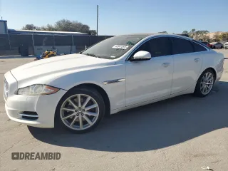 2013 Jaguar XJ with VIN SAJWJ1CD7D8V49845, listed as a Copart auction lot 44541595 with 115,931 mi miles and Clean Title. Bid and sale history available at carsss.com. Image 1.