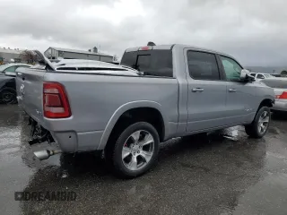 2020 Ram 1500 Laramie with VIN 1C6SRFJM7LN355667, listed as a Copart auction lot 45062385 with 121,512 mi miles and Salvage title. Bid and sale history available at DreamBid. Image 3.