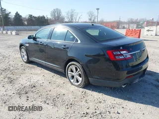 2013 Ford Taurus SEL with VIN 1FAHP2E96DG148836, listed as a IAAI auction lot 42030387 with 192,218 mi miles and . Bid and sale history available at carsss.com. Image 3.