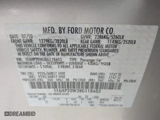 2011 Ford Taurus SE with VIN 1FAHP2DW3BG118603, listed as a IAAI auction lot 41944340 with 34,451 mi miles. Bid and sale history available at carsss.com. Image 9.