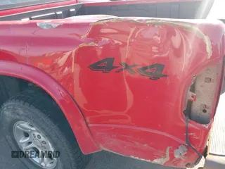 2004 Dodge Dakota Sport with VIN 1D7HG38KX4S735459, listed as a IAAI auction lot 41402108 with 262,730 mi miles. Bid and sale history available at carsss.com. Image 6.
