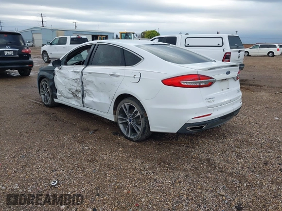 2019 Ford Fusion Titanium with VIN 3FA6P0D93KR138574, listed as a IAAI auction lot 41967094 with 118,297 mi miles. Bid and sale history available at carsss.com. Image 3.