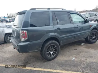 2006 Honda Pilot EX with VIN 5FNYF18426B014815, listed as a IAAI auction lot 42109149 with 284,163 mi miles and . Bid and sale history available at DreamBid. Image 4.