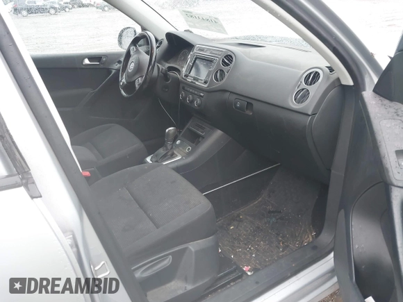 2017 Volkswagen Tiguan S with VIN WVGBV7AX4HK051172, listed as a IAAI auction lot 41843182 with 160,010 mi miles and . Bid and sale history available at DreamBid. Image 5.