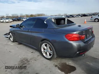 2015 BMW 4 Series 435i xDrive with VIN WBA3T7C53F5A37043, listed as a Copart auction lot 87697145 with 98,031 mi miles and Salvage title. Bid and sale history available at DreamBid. Image 2.