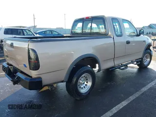 1997 Ford F-150 XL with VIN 1FTDX18W7VKB72498, listed as a IAAI auction lot 41390245 with 55,945 mi miles. Bid and sale history available at carsss.com. Image 4.
