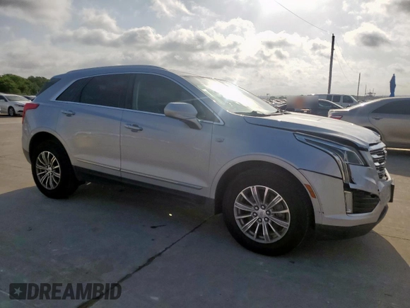 2018 Cadillac XT5 Luxury FWD with VIN 1GYKNCRS2JZ208016, listed as a Copart auction lot 61551285 with 145,019 mi miles and Salvage title. Bid and sale history available at DreamBid. Image 4.