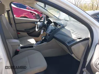 2018 Ford Focus SE with VIN 1FADP3F2XJL310931, listed as a IAAI auction lot 41983492 with 115,363 mi miles. Bid and sale history available at carsss.com. Image 5.