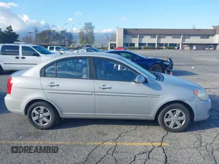 2006 Hyundai Accent GLS with VIN KMHCN46C86U007833, listed as a IAAI auction lot 41760603 with 60,030 mi miles. Bid and sale history available at carsss.com. Image 13.