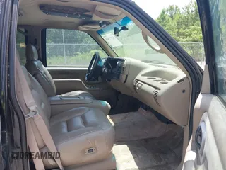 1996 Chevrolet Suburban with VIN 3GNEC16R3TG120004, listed as a IAAI auction lot 42752410 with 291,491 mi miles and . Bid and sale history available at DreamBid. Image 5.