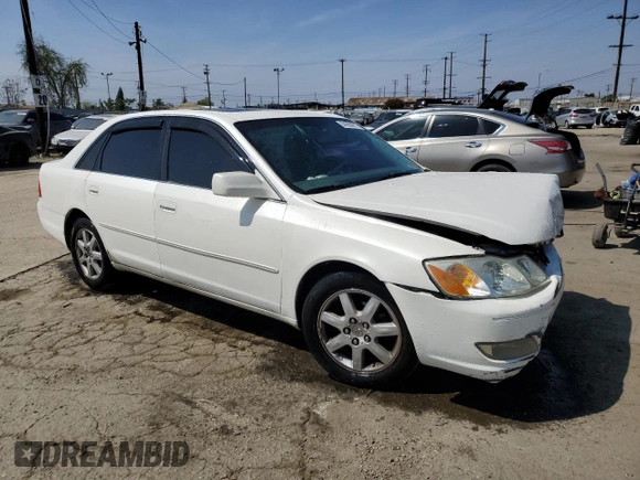 2000 Toyota Avalon XL with VIN 4T1BF28B9YU068001, listed as a Copart auction lot 54958915 with 240,232 mi miles and Salvage Title. Bid and sale history available at DreamBid. Image 4.