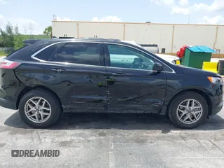 2024 Ford Edge SEL z VIN 2FMPK4J97RBA94298, wystawiony jako IAAI lot #42438544 z przebiegiem 39 589 mil mil oraz . Historia ofert i sprzedaży dostępna na DreamBid. Obrazek 6.