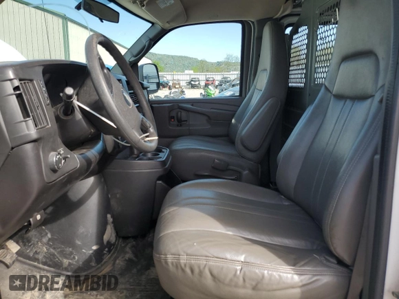 2012 Chevrolet Express Cargo with VIN 1GCSGAFX0C1189889, listed as a Copart auction lot 53987705 with 216,699 mi miles and Salvage title. Bid and sale history available at DreamBid. Image 7.