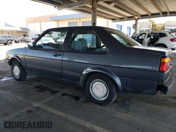 1989 Volkswagen Jetta z VIN WVWKB01G2KW684385, wystawiony jako Copart lot #49694065 z przebiegiem 63 792 mil mil oraz Czysty tytuł • Clean title. Historia ofert i sprzedaży dostępna na DreamBid. Obrazek 2.