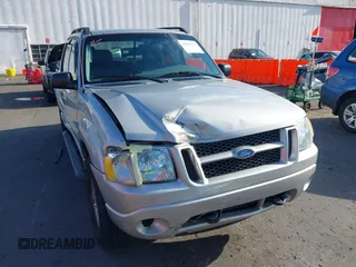 2004 Ford Explorer Sport Trac XLS z VIN 1FMDU77K74UB69268, wystawiony jako IAAI lot #42055157 z przebiegiem 127 573 mil mil oraz . Historia ofert i sprzedaży dostępna na DreamBid. Obrazek 6.
