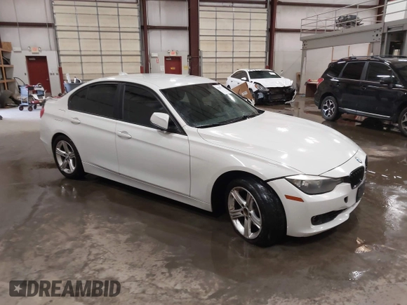 2014 BMW 3 Series 328i with VIN WBA3C1C52EK112194, listed as a IAAI auction lot 41694770 with 139,609 mi miles. Bid and sale history available at carsss.com. Image 1.