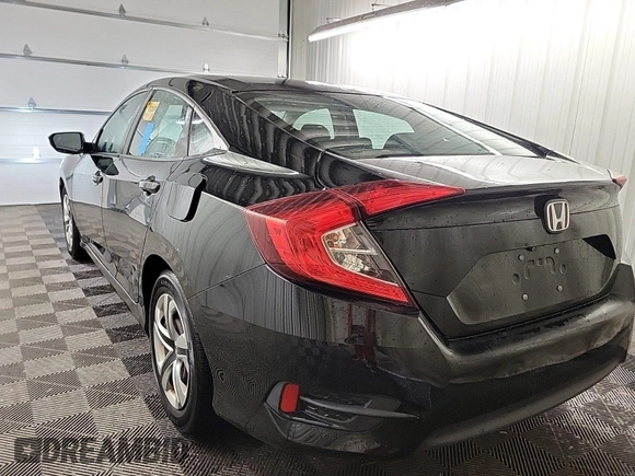 2017 Honda Civic LX with VIN 2HGFC2F58HH575889, listed as a IAAI auction lot 42285632 with 63,687 mi miles and . Bid and sale history available at DreamBid. Image 48.