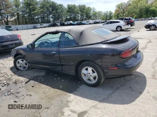 1998 Pontiac Sunfire z VIN 4G2JB32T1WB201350, wystawiony jako Copart lot #53074805 z przebiegiem 128 486 mil mil oraz Szkody całkowita. Historia ofert i sprzedaży dostępna na DreamBid. Obrazek 2.