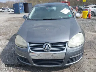 2005 Volkswagen Jetta Sedan 2.5L with VIN 3VWSG71K35M617763, listed as a IAAI auction lot 41963065 with 200,915 mi miles. Bid and sale history available at carsss.com. Image 12.
