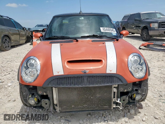 2007 MINI Convertible S with VIN WMWRH33547TJ43144, listed as a Copart auction lot 65440545 with 88,073 mi miles and Salvage title. Bid and sale history available at DreamBid. Image 5.