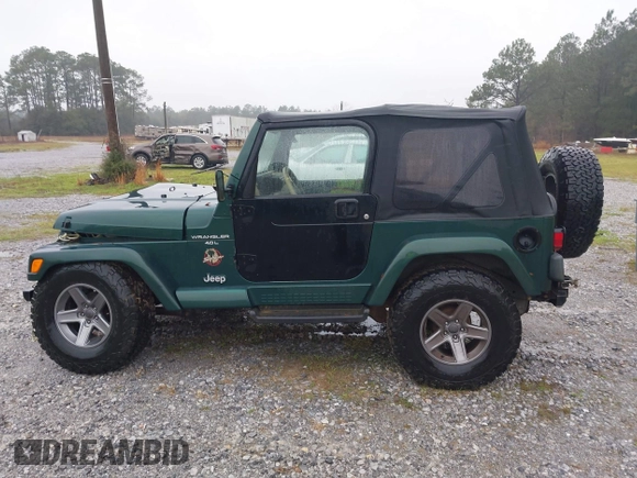 2000 Jeep Wrangler Sahara with VIN 1J4FA59SXYP701098, listed as a IAAI auction lot 41592872 with 1 mi miles. Bid and sale history available at carsss.com. Image 13.