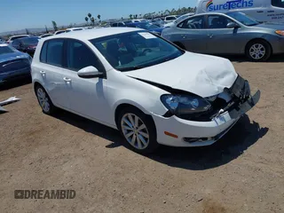 2014 Volkswagen Golf TDI w/Sunroof & Nav z VIN WVWDM7AJ1EW003256, wystawiony jako IAAI lot #42239048 z przebiegiem 66 327 mil mil oraz . Historia ofert i sprzedaży dostępna na DreamBid. Obrazek 1.