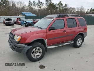 2001 Nissan Xterra XE with VIN 5N1ED28T71C572571, listed as a Copart auction lot 89023865 with 215,323 mi miles and Salvage Title. Bid and sale history available at DreamBid. Image 1.
