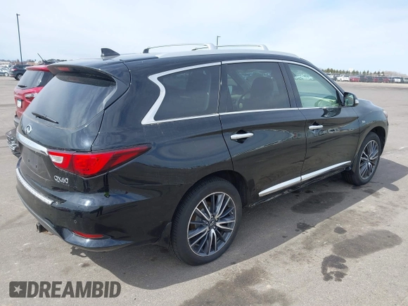 2017 Infiniti QX60 with VIN 5N1DL0MM0HC501577, listed as a IAAI auction lot 41887364 with 124,602 mi miles and . Bid and sale history available at DreamBid. Image 4.