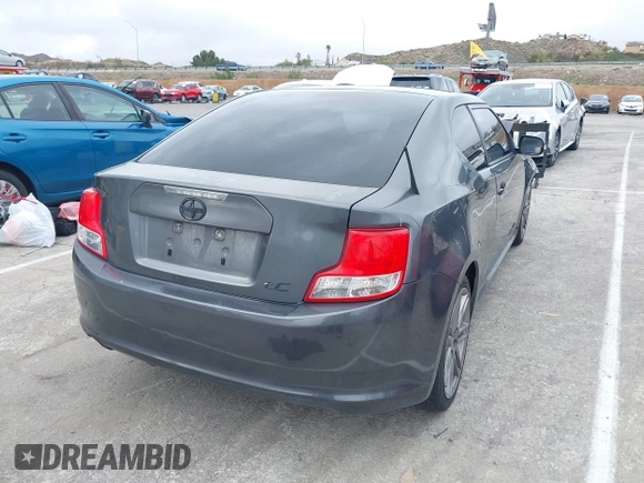 2013 Scion tC with VIN JTKJF5C74D3052964, listed as a IAAI auction lot 41804627 with 244,013 mi miles. Bid and sale history available at carsss.com. Image 4.
