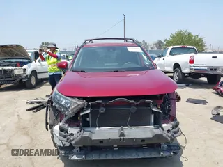 2019 Toyota RAV4 LE with VIN JTMK1RFV4KD025587, listed as a IAAI auction lot 42459046 with 73,852 mi miles and . Bid and sale history available at DreamBid. Image 13.