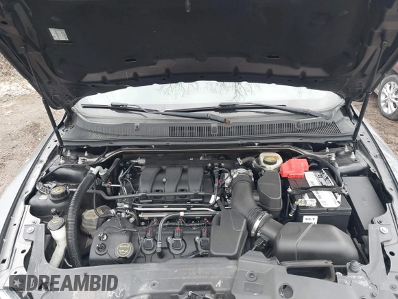2015 Ford Taurus Limited with VIN 1FAHP2J88FG153326, listed as a IAAI auction lot 41465344 with 98,727 mi miles. Bid and sale history available at carsss.com. Image 10.