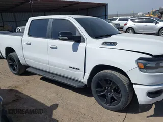 2021 Ram 1500 Big Horn with VIN 1C6SRFFT0MN521027, listed as a IAAI auction lot 41830596 with 55,013 mi miles and . Bid and sale history available at DreamBid. Image 1.