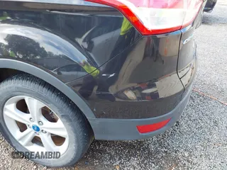 2013 Ford Escape SE с VIN 1FMCU0GX5DUC84594, выставлен на аукционе IAAI как лот 42218059 с пробегом 97 670 миль миль и . История ставок и продаж доступна на DreamBid. Изображение 18.
