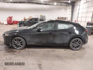 2021 Mazda Mazda3 Hatchback Preferred with VIN JM1BPBLL2M1402821, listed as a IAAI auction lot 41068897 with 75,271 mi miles. Bid and sale history available at carsss.com. Image 14.