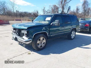 1999 Chevrolet Tahoe Z71 z VIN 1GNEK13R2XJ325602, wystawiony jako IAAI lot #41590107 z przebiegiem 204 611 mil mil oraz . Historia ofert i sprzedaży dostępna na DreamBid. Obrazek 2.