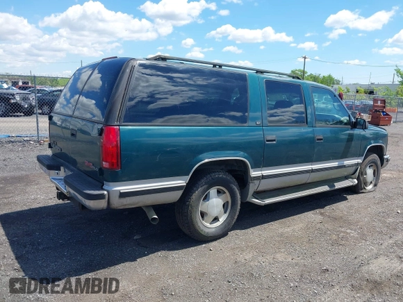 1997 GMC Suburban with VIN 1GKFK16R6VJ706590, listed as a IAAI auction lot 42194855 with 155,680 mi miles and . Bid and sale history available at DreamBid. Image 4.